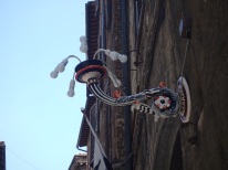 A light fixture in the Lupa contrada, which won the Palio after going 27 years without a victory