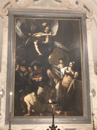 Caravaggio - "The Seven Works of Mercy" (1607) inside the Pio Monte Delle Misericordia Church.