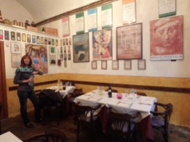 My friend Paola inside the osteria. The wall was covered with posters, some decades old, of the famous Spoleto music festival.