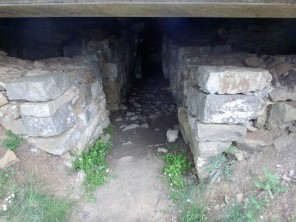 An entrance to the Etruscan tombs, excavated in 1915. Decorations in iron and bronze were found inside, likely ruins of a war chariot.